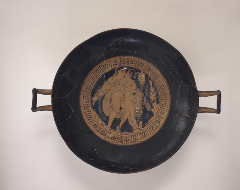 This Faliscan Red Figure kylix (cup)was found in the chamber tomboutside Civita Castellana. Thepainting on the interiorof the cup shows theembrace of Bacchusand Ariadne. UPM Image #152705.