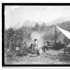 Expedition Camp, Chilkoot village. Shotridge at Camp site.