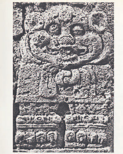 Close up of a carving of a jaguar throne.