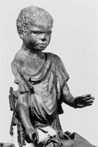 The same statue, after being cleaned, reveals the figure of a Negro youth. Now in the Bodrum Museum, the statue was on exhibit in the university Museum during the loan exhibit of Turkish Art Treasures.