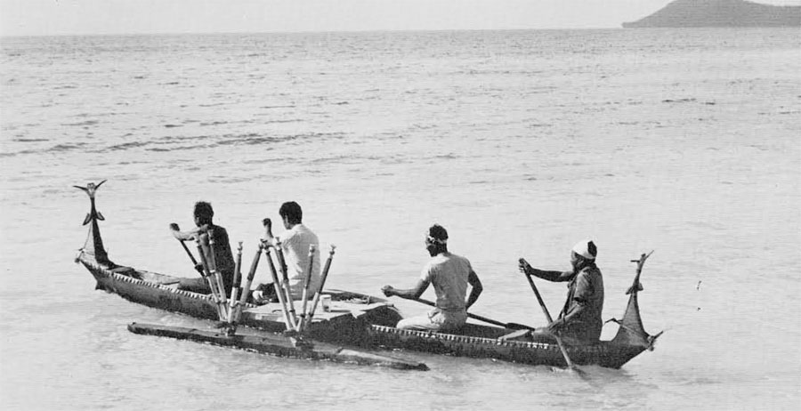 The paddle canoe is still an item of value. here the one acquired for the University Museum is being sent on its maiden voyage. 