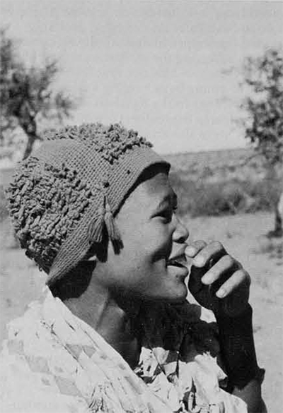 A Bushman woman enjoying a joke. 