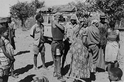 The first (acculturated) Bushmen we met were a scraggy lot. Working for Herero cattle owners they inherit all sorts of left-over clothes, very welcome during the winter months of July and August when the night temperature in the desert goes below freezing. 
