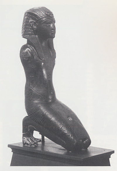 Bronze statuette of an Amarna Period king. Possibly depicting Tutankhamun, this figure, which originally had inlays of gold in various parts of the body, was part of a larger composition