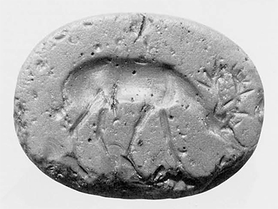 Red stone seal of scaraboid type depicting a grazing stag. Greek, second half of the 5th century B.C.  Gordion inventory SS 153. 