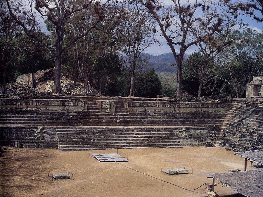Looking toward the Jaguar staircase of Copan's East Court. the Olive of Sub-Jaguar staircase and the newly discovered tomb chamber lie more than 4 meters below the present surface. Both are accessible only from archaeological tunnels cut in from the Corte, an eroded section of the Acropolis (see Fig. 2). 