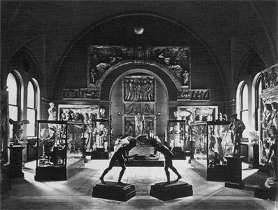 Fig.7. Pepper Hall at the University of Pennsylvania Museum Ca. 1906. In its early days, the hall displayed many bronze reproductions and plaster casts, along with original artifacts and sculpture from the classical world. In the foreground are the "Wrestlers," part of a colelctions of bronze reproductions commissioned and given to the Museum by John Wanamaker in 1904/05 