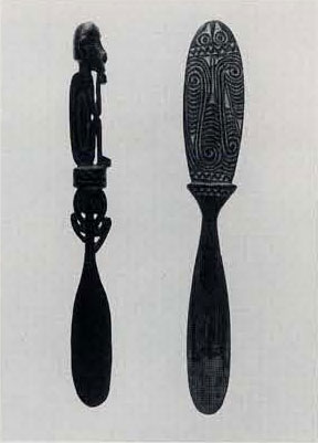 Lime spatulas: In the Massim culture distric of East Papua New Guinea, powdered lime is conveyed directly from the lime container to the mouth of the betel chewer. The museum has over 100 lime spatulas from this area, which is known for extraordinary decorative quality and variety of its carvings. (L) Lime Spatula, Wood, pigment. Trobriand Islands, early 20th century. Museum Object Number: P3046. (R) Lime Spatula. Wood, pigment. Woodlark Island, early 20th century. museum Object Number: P3055