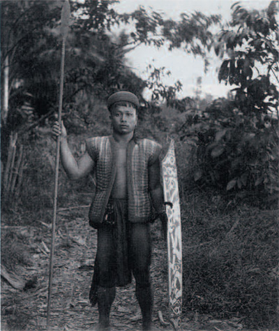 Tegang, a young Kayan (Dayak) warrior who offered his services to Harrison and Hiller in Dutch West Borneo, 1897. Phot by Alfred C. Harrison, Jr.