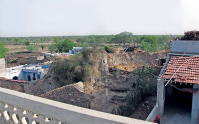 Chatrikhera village with intact portion of mound as seen from highest roof in the village.