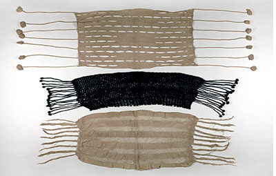 These women’s cotton head ties or shawls with long fringe and tassels are now in the Museum collection. They demonstrate weaving techniques such as knotting and openwork designs of the Vai people that the Liberian Government exhibited in the Agricultural Hall, Columbian Exposition. UPM object #2003-63-154, 2003-63-84, and 2003-63-153. 