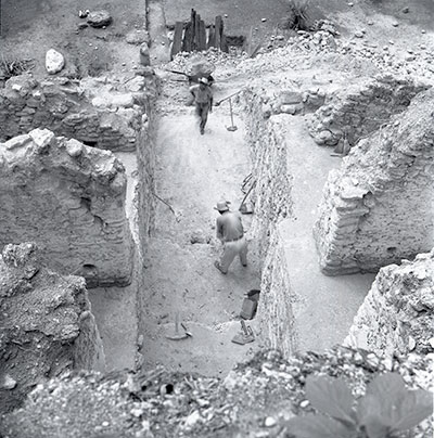 Upper end of trench, cutting through floors of 5D-34 temple rooms. UPM image #59-17-94.