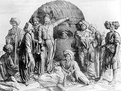 Engraving of a group of excavators with a colossal ancient Egyptian statue head.