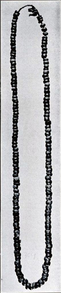 A necklace made of many small round jadeite beads