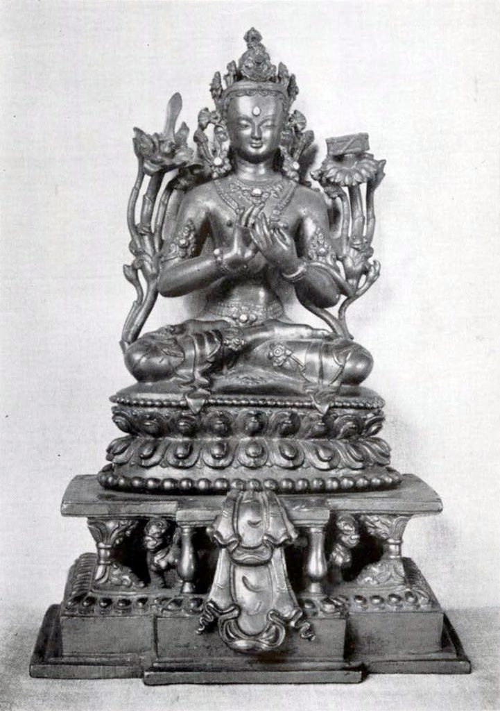 Gilt bronze Manjusri with turquoise inlay, flanked by two lotus stalks holding a sword and sutra, seated on a lotus