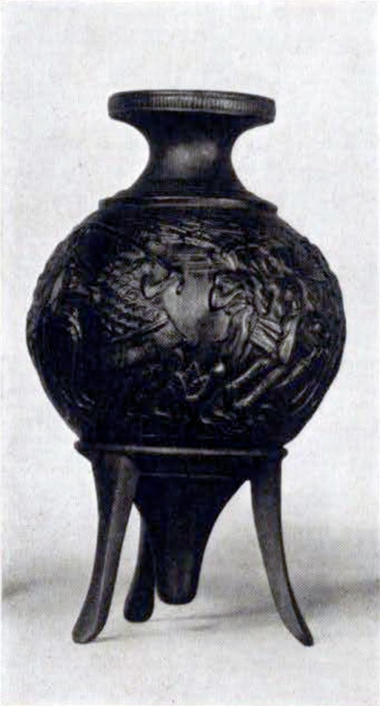 A rhyton or vase on a tripod showing a sacrificial procession in relief