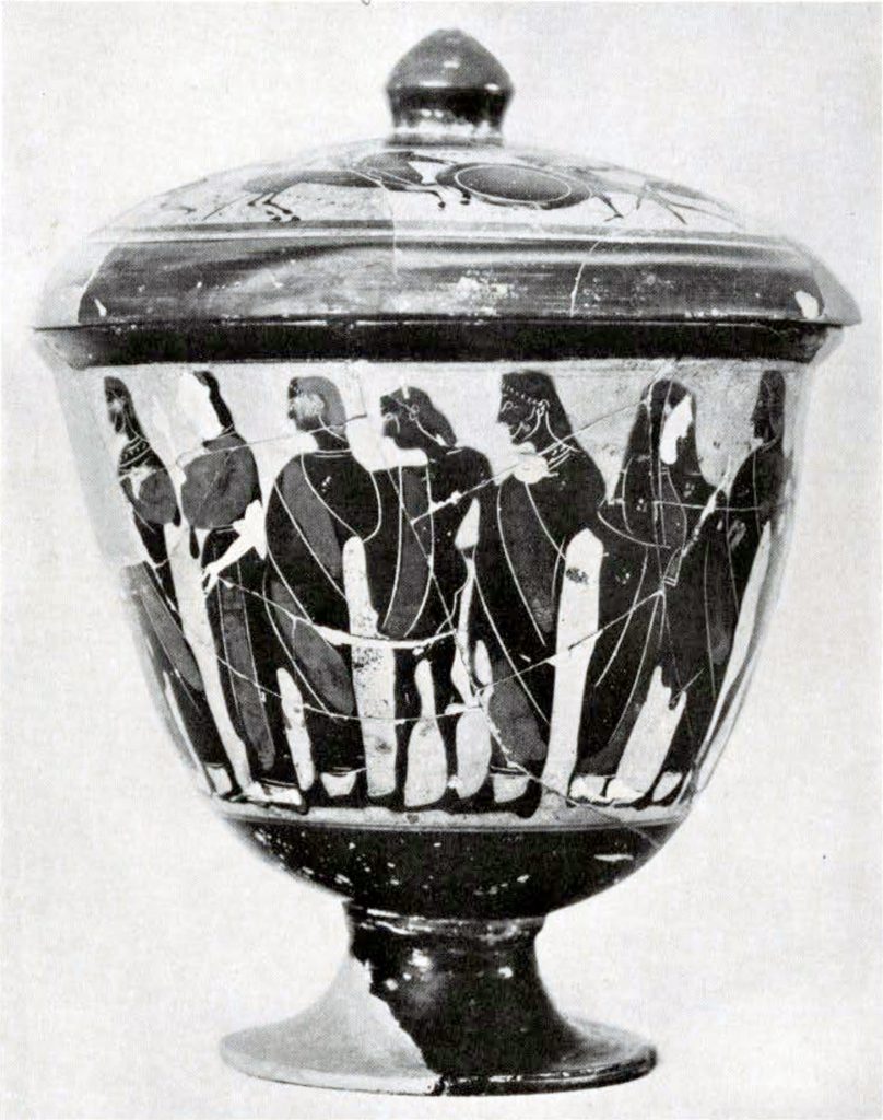 A covered bowl showing a line of people in draped clothing around the outside