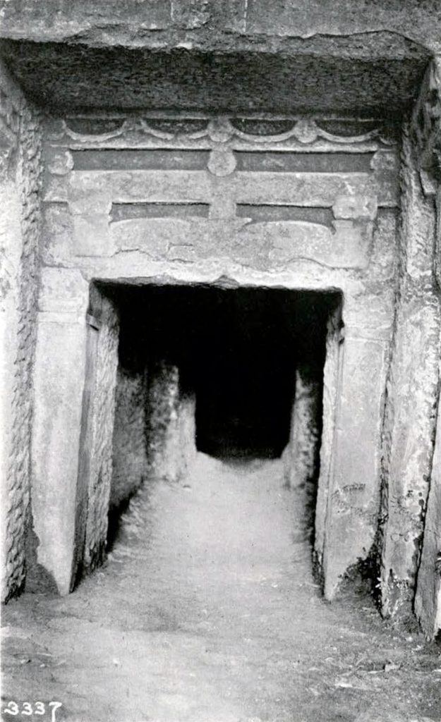 Carved square entrance to a tunel