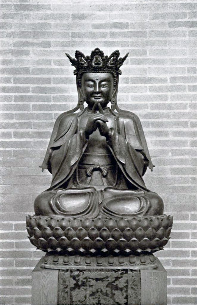Gilt bronze statue of Vairochana Buddha, seated cross legged on a lotus throne