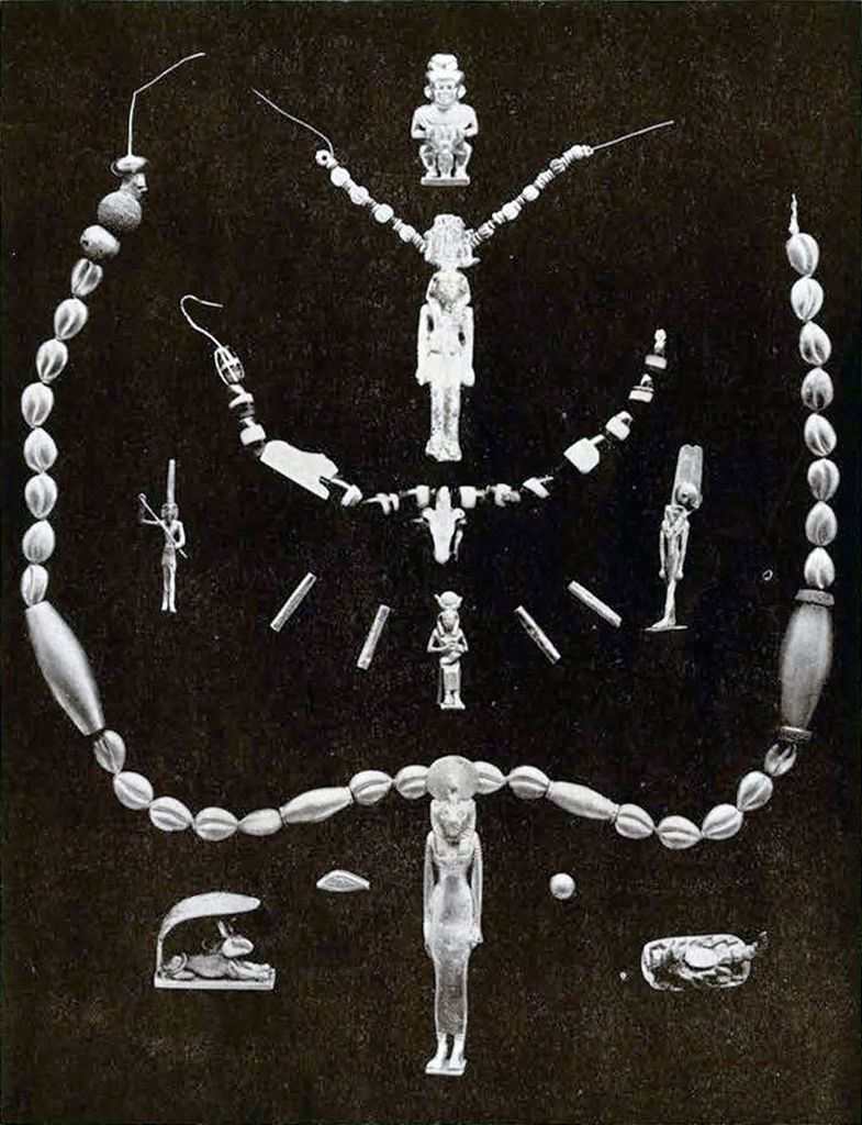 An assortment of gold necklaces and amulets