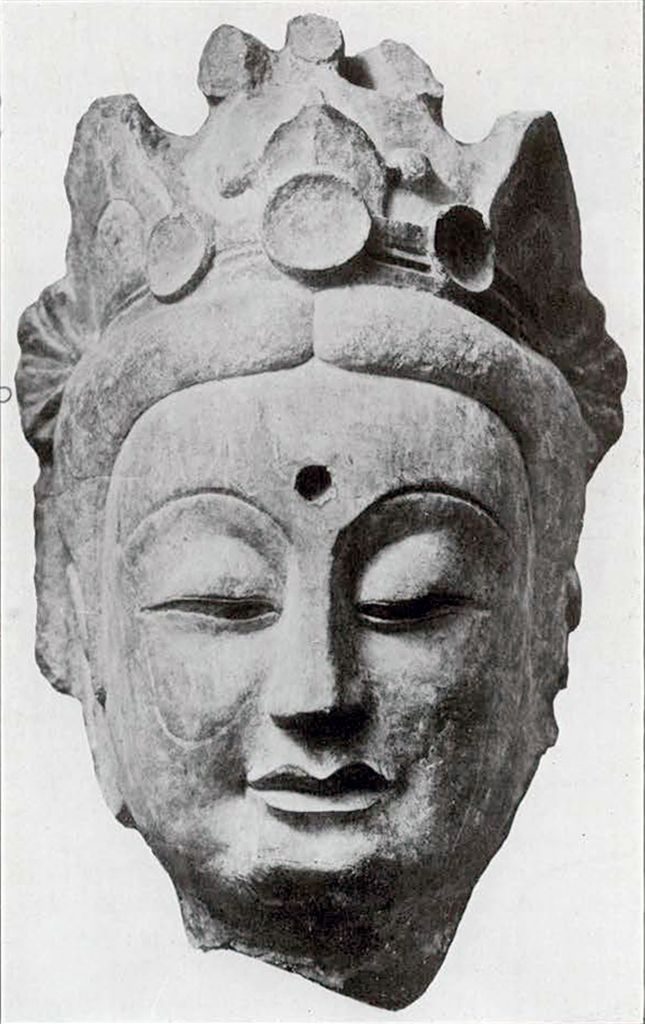 Colossal head of a Bodhisattva with Urna and 3 peaked crown