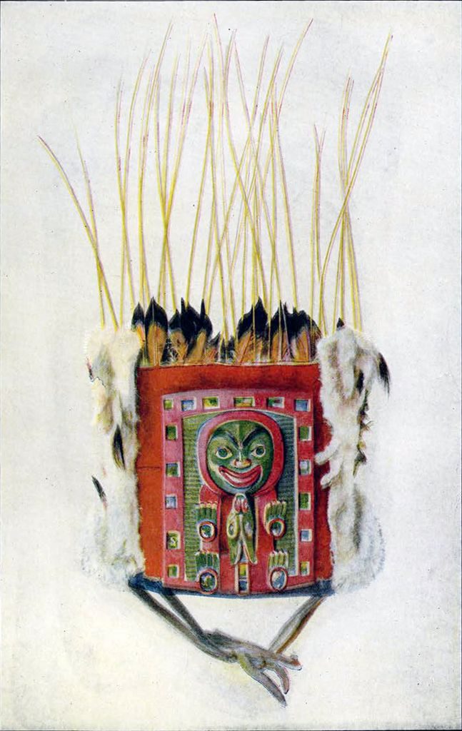 Ceremonial headdress with grizzly bear and wolf, with stalks and feathers lining the top