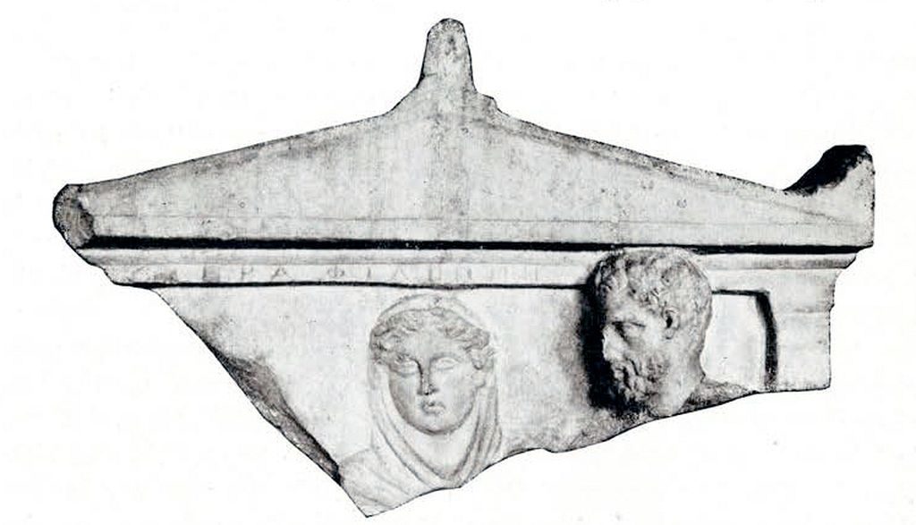 Fragment of Pentelic marble of a woman in low relief and a man in high relief
