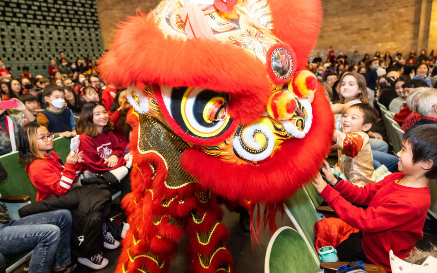 Dragon dance in the Harrison Auditorium.