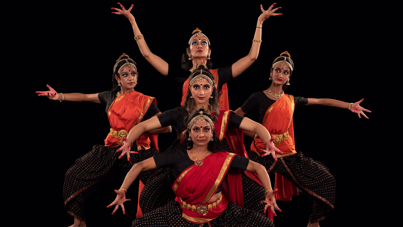 Women in South Asian garb performing.