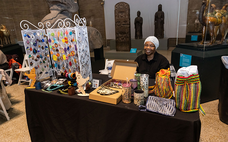 Woman selling handcrafted items.