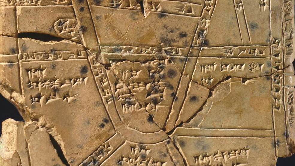 Ancient map tablet with cuneiform writing.