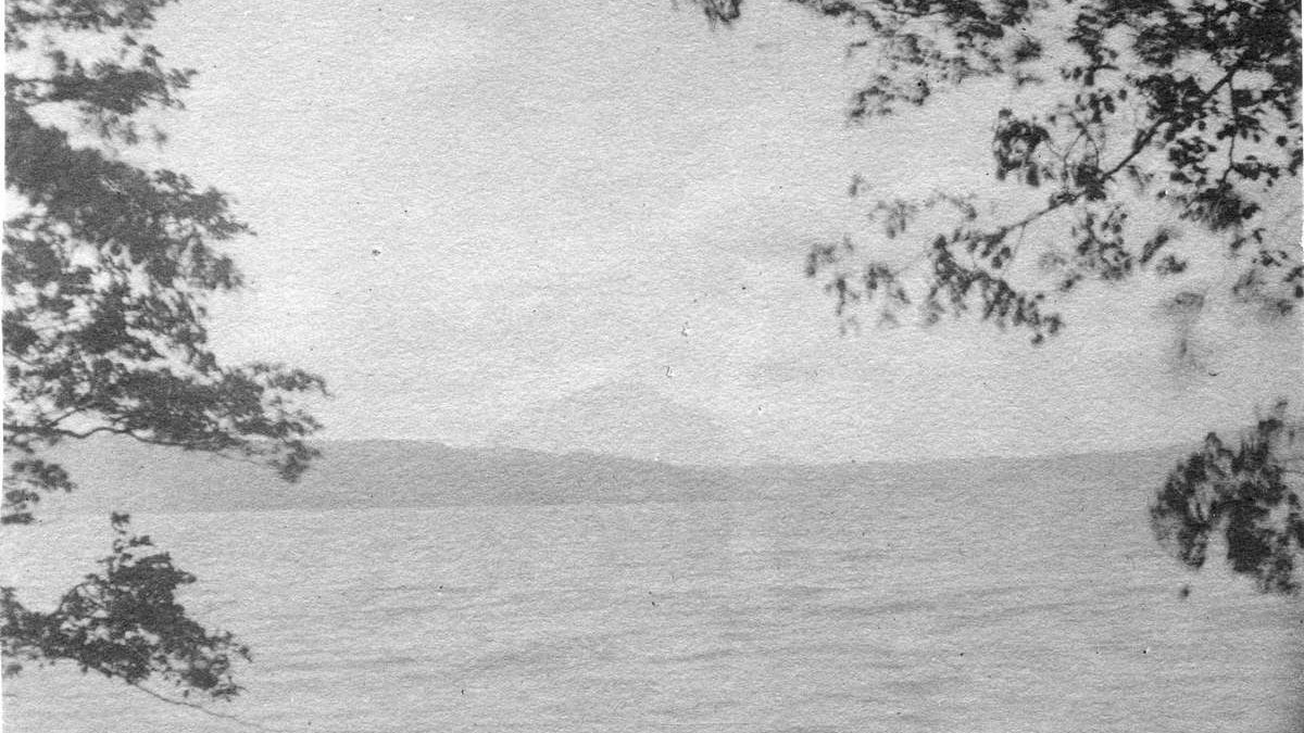 Photo of a mountain across the water.