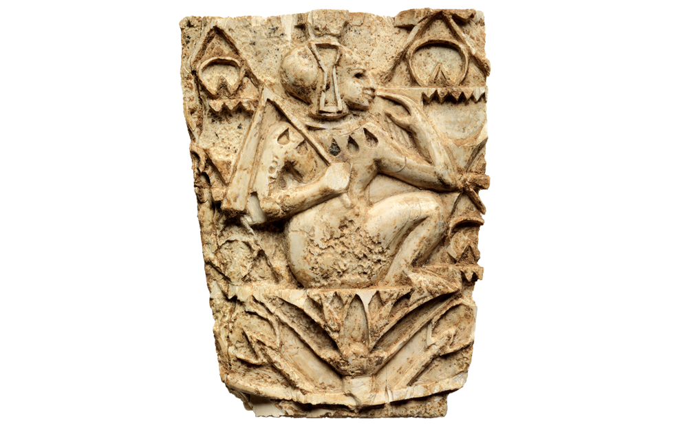 Ivory inlay of Horus Seated on Lotus. 