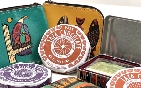 An assortment of items from the gift shop, including chocolates, soap tins, and coin purses.