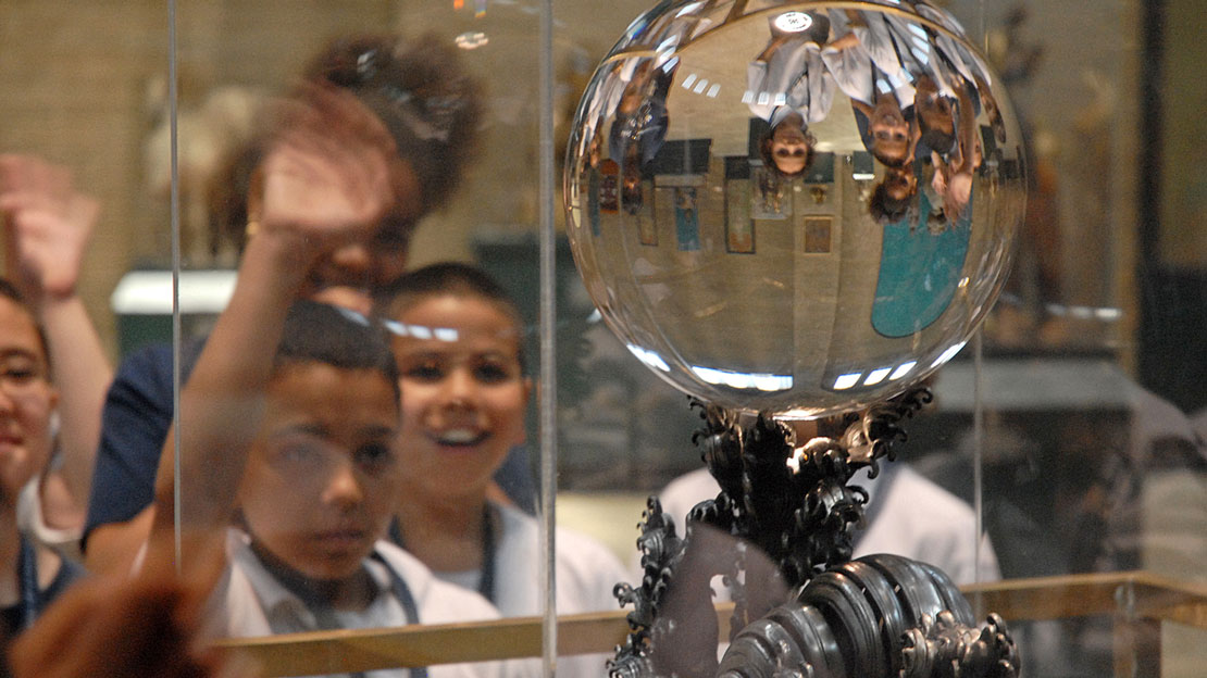 A group of students admiring the Crystal Ball.
