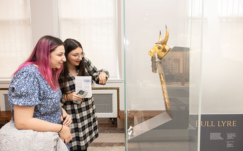 Two women looking at an exhibit.