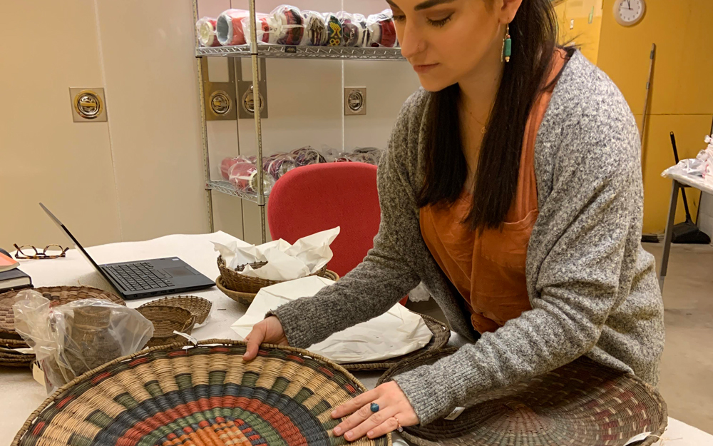 A person handling baskets in the collection.