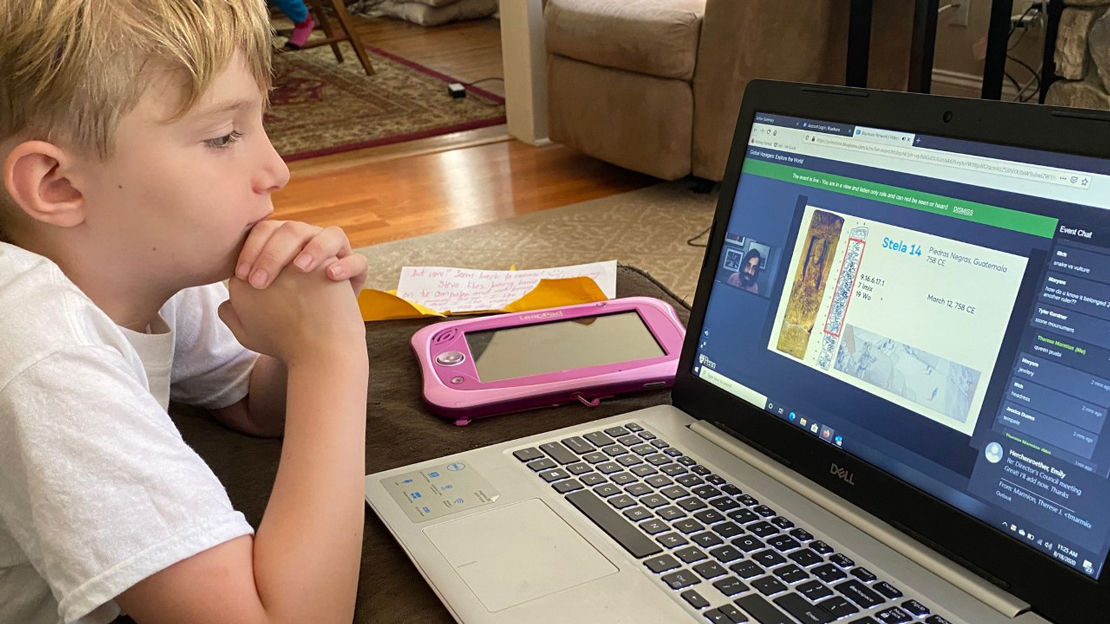 A child attending a virtual At-Home Anthro Live session
