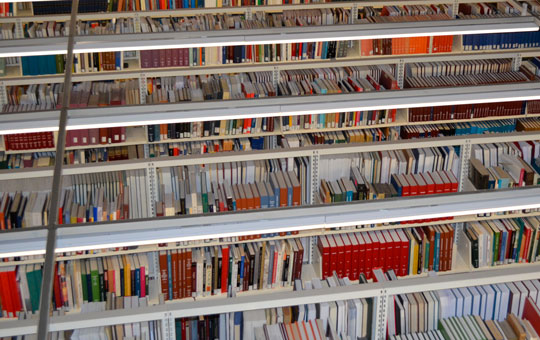 Library shelves full of books.