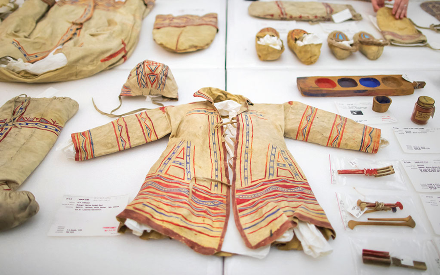 Artifacts laid out on a table for study.