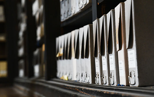 Archival boxes for publications.