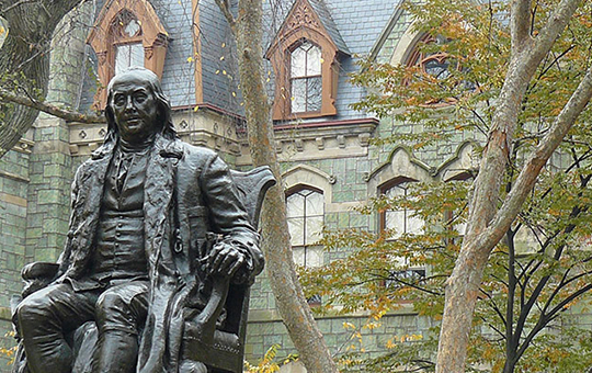 A statue on Penn's campus of Ben Franklin.