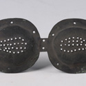 Bronze Eyeshade, 7th-9th century CE, Excavated from Tomb No. 227, Astana, Turpan,  © Xinjiang Uygur Autonomous Region Museum Collection.