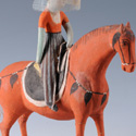 Painted clay figure of an equestrienne, ca 7th-9th century CE. Excavated from Tomb No.187, Astana Turfan, Xinjiang Uygur Autonomous Region, China. © Xinjiang Uygur Autonomous Region Museum.