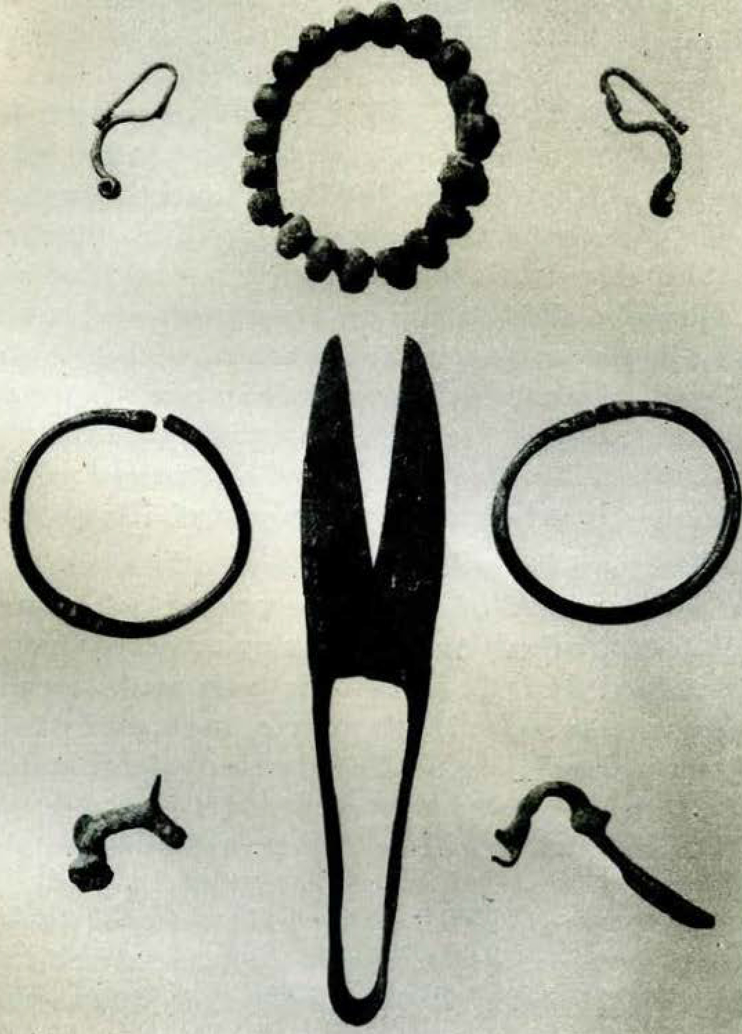 Bronze Objects: La Tene` and Roman Types from Central Bohemia, including bracelets, earrings, scissors