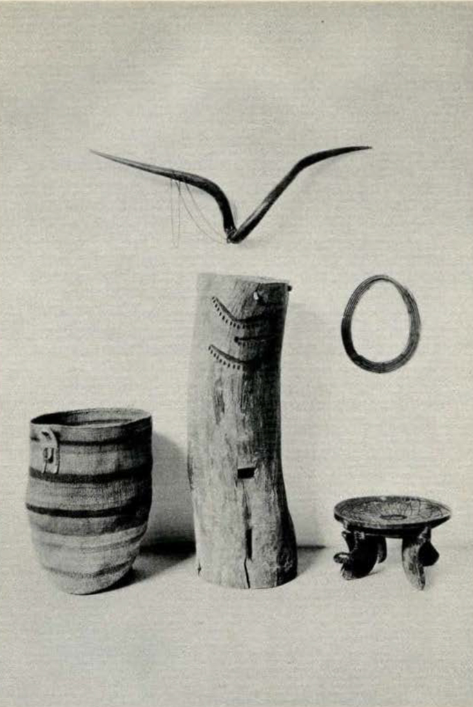 Five objects, including a necklace, a basket, and stool