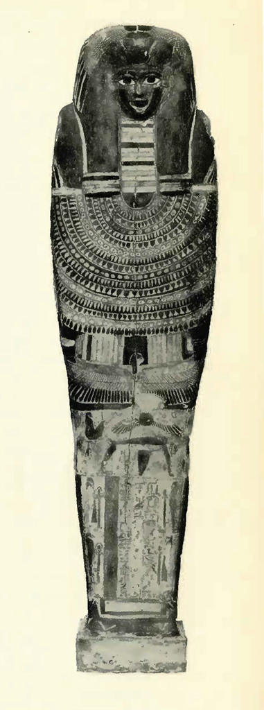 Coffin lid depicting a realistic head and face, the body covered in designs