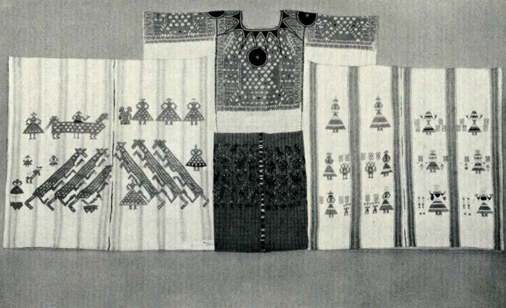 Several pieces of an outfit that have been intricately embroidered