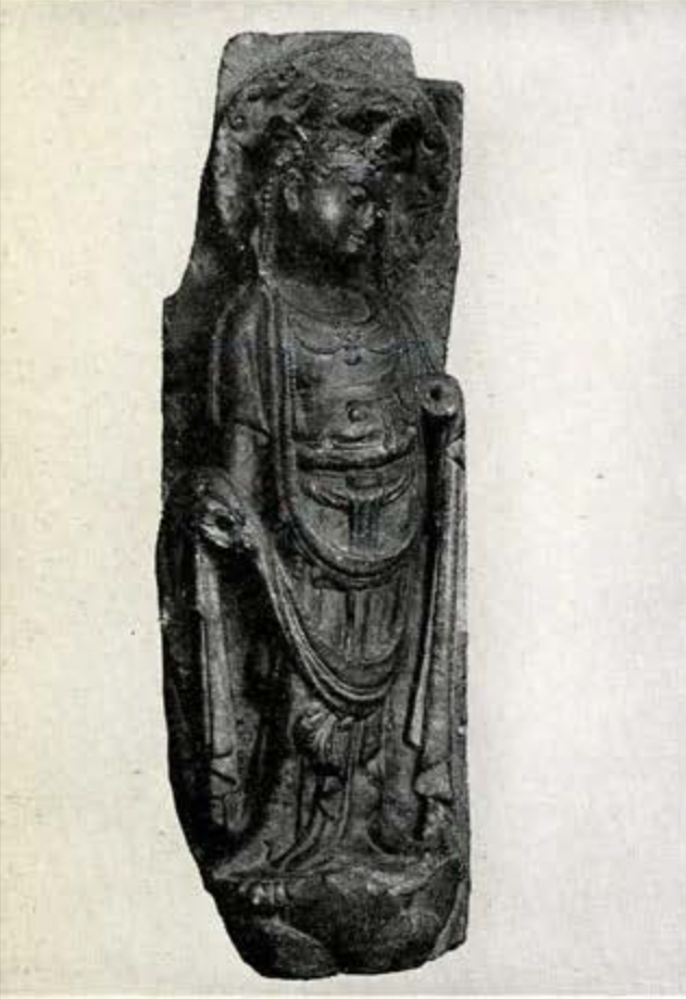 Bas relief of a Bodhisattva with both arms broken off at the elbows, in draped clothing and pearls