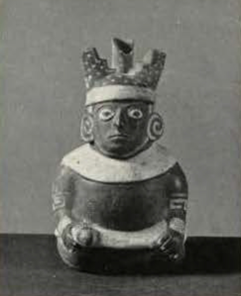 Stirrup spout effigy vessel of a seated man with a war club and a headdress